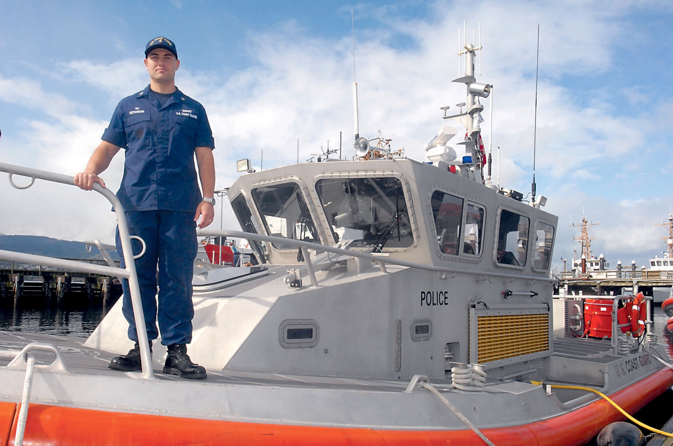 Coast Guard Boatswain’s Mate Chief Petty Officer Philip Ketcheson stands on the bow of a patrol boat at U.S. Coast Guard Air Station/Sector Field Office Port Angeles. —Photo by Keith Thorpe/Peninsula Daily News ()