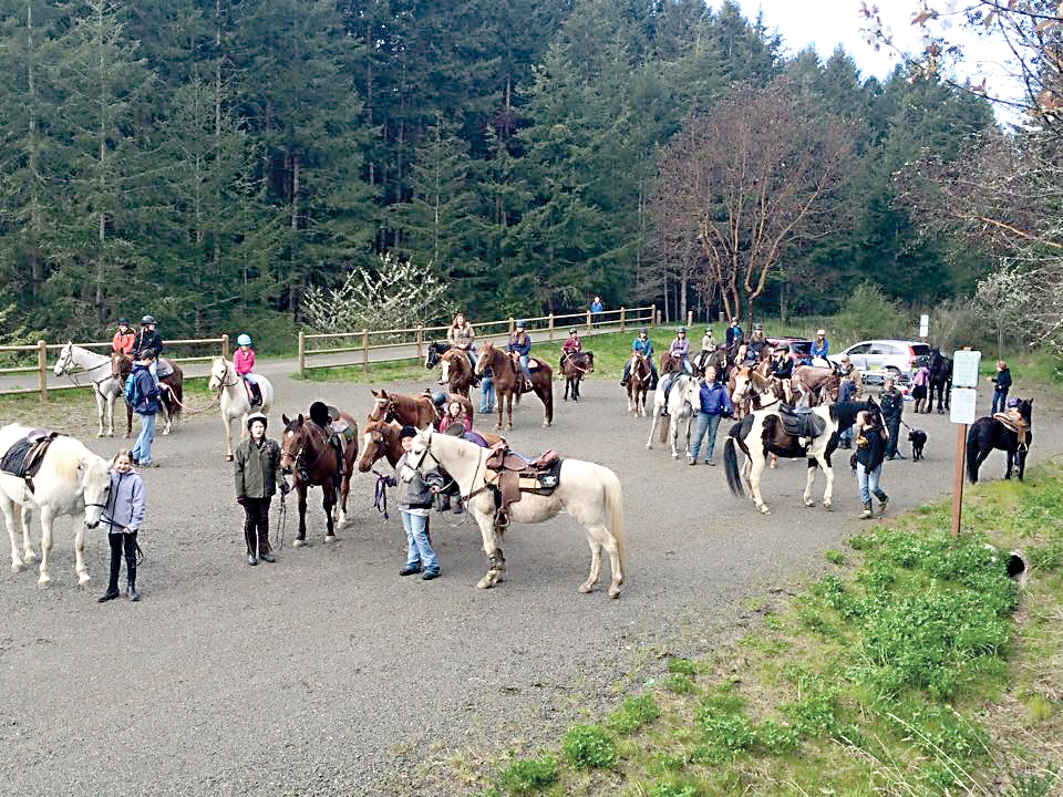 Riders gather at the Cape George Trailhead for the annual Jefferson County Horse 4-H Program and Equitese Pony Club Ride-a-thon on April 11. Proceeds helped pay for all 4-H youths to attend the Jefferson County 4-H Horse Camp in July for free.  —Photo by Amy Thompson ()