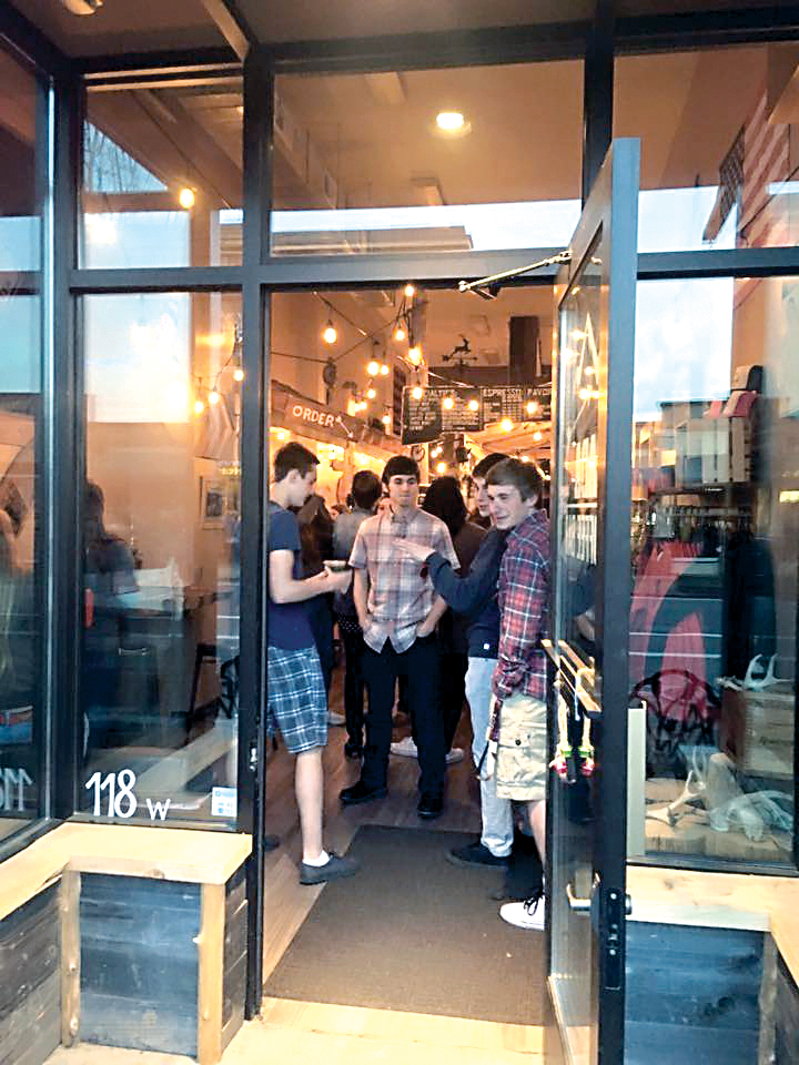 Teenagers pack Bada NW Coffee Bar for the inaugural Pacific Reign karaoke night earlier this month. The event attracted 78 teens as part of a plan to found a coffeehouse teen center and activity group. (Leslie Robertson)