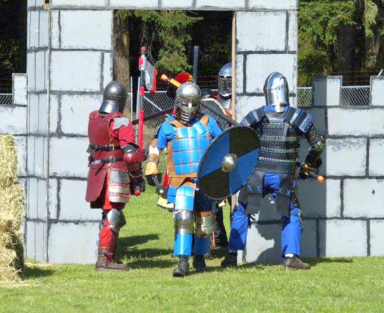 Knights emerge onto the field of battle during the 2015 Maypole Medieval Festival & Tournament. This year's festival