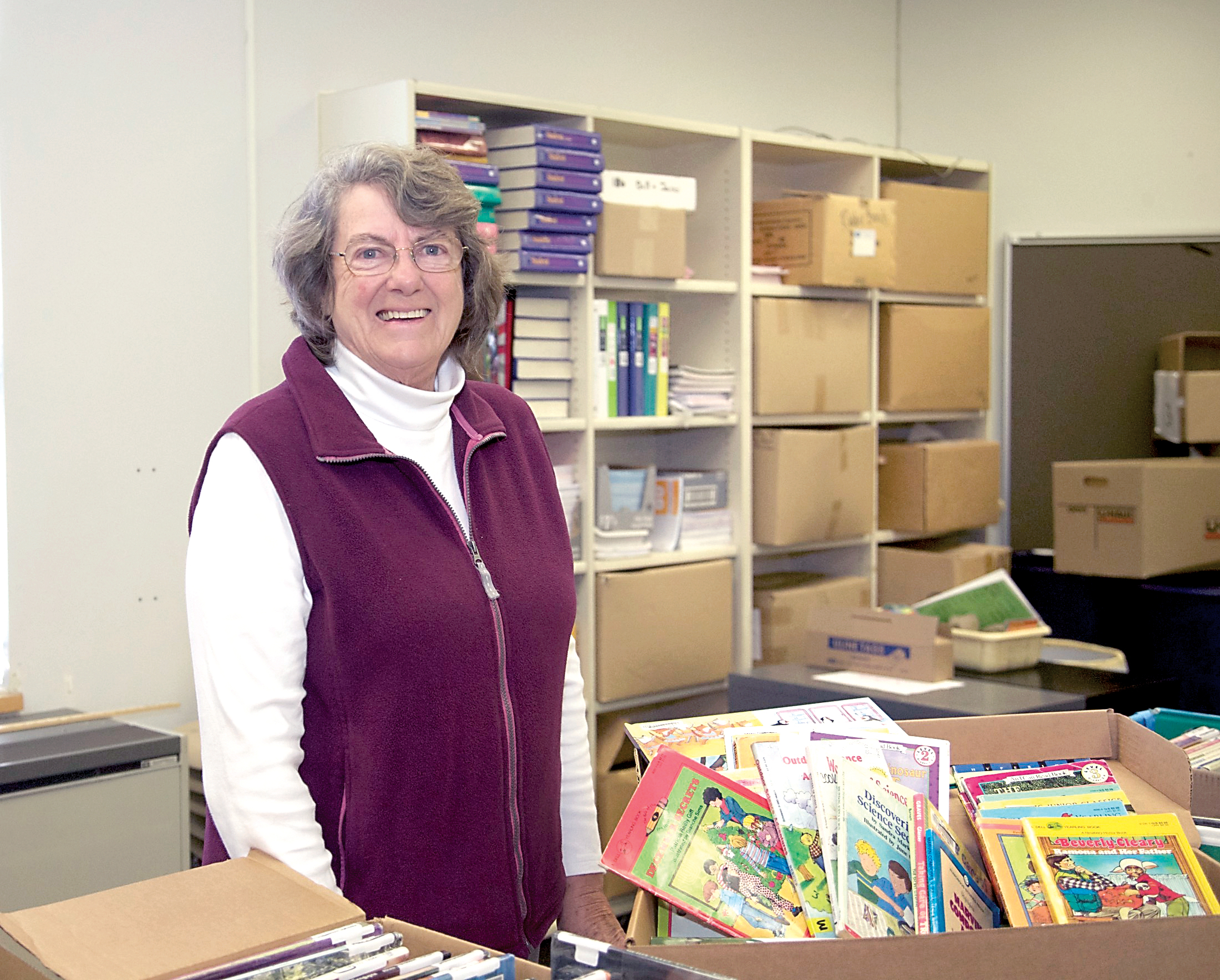 2016 Heart of Service winners Elma Beary in the book holding room at Chimacum Elementary School. (Steve Mullensky/for Peninsula Daily News)