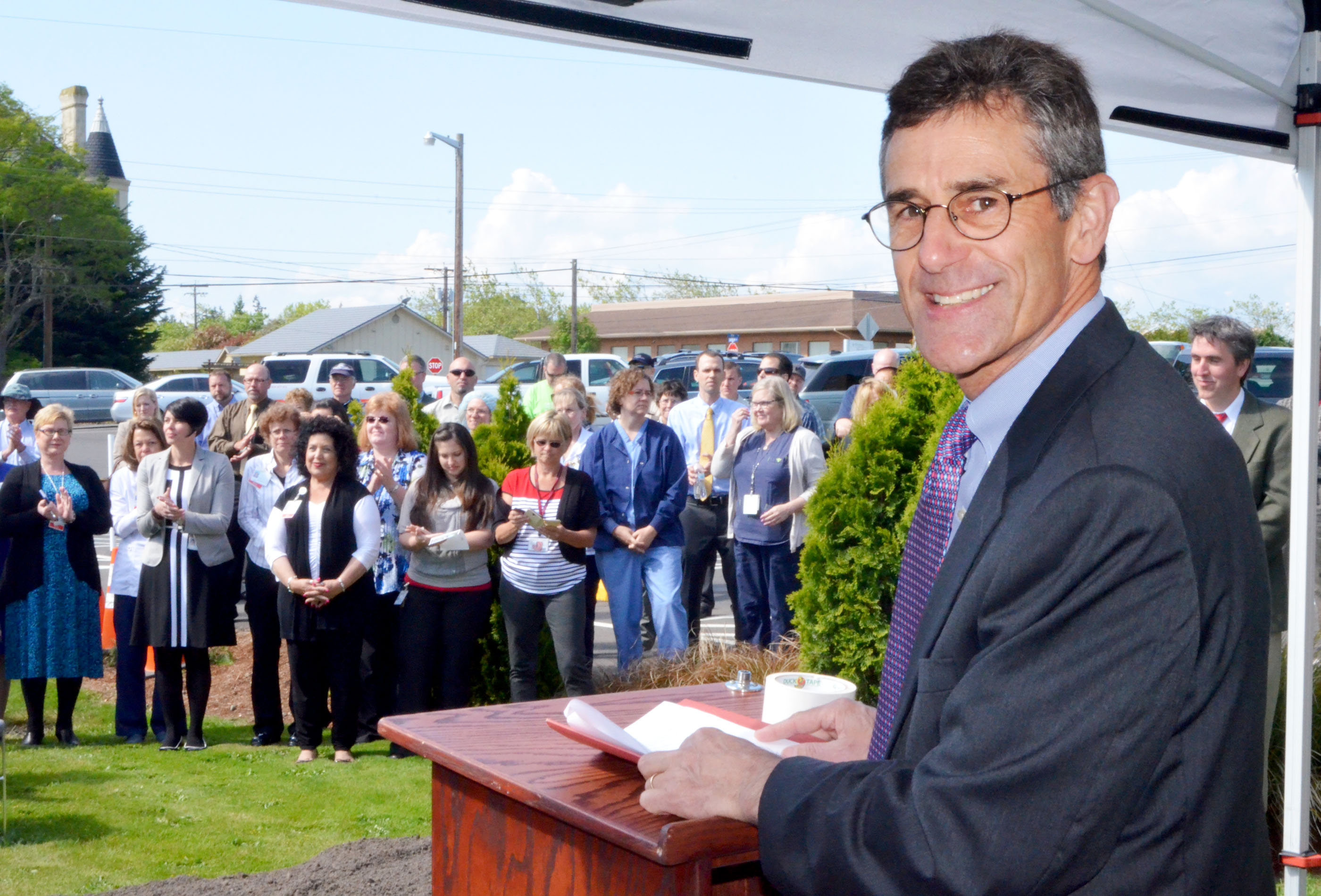 Jefferson Healthcare CEO Mike Glenn finishes his remarks at the groundbreaking of the new Emergency and Special Services Building for the Port Townsend hospital Monday. —Photo by Charlie Bermant/Peninsula Daily News ()