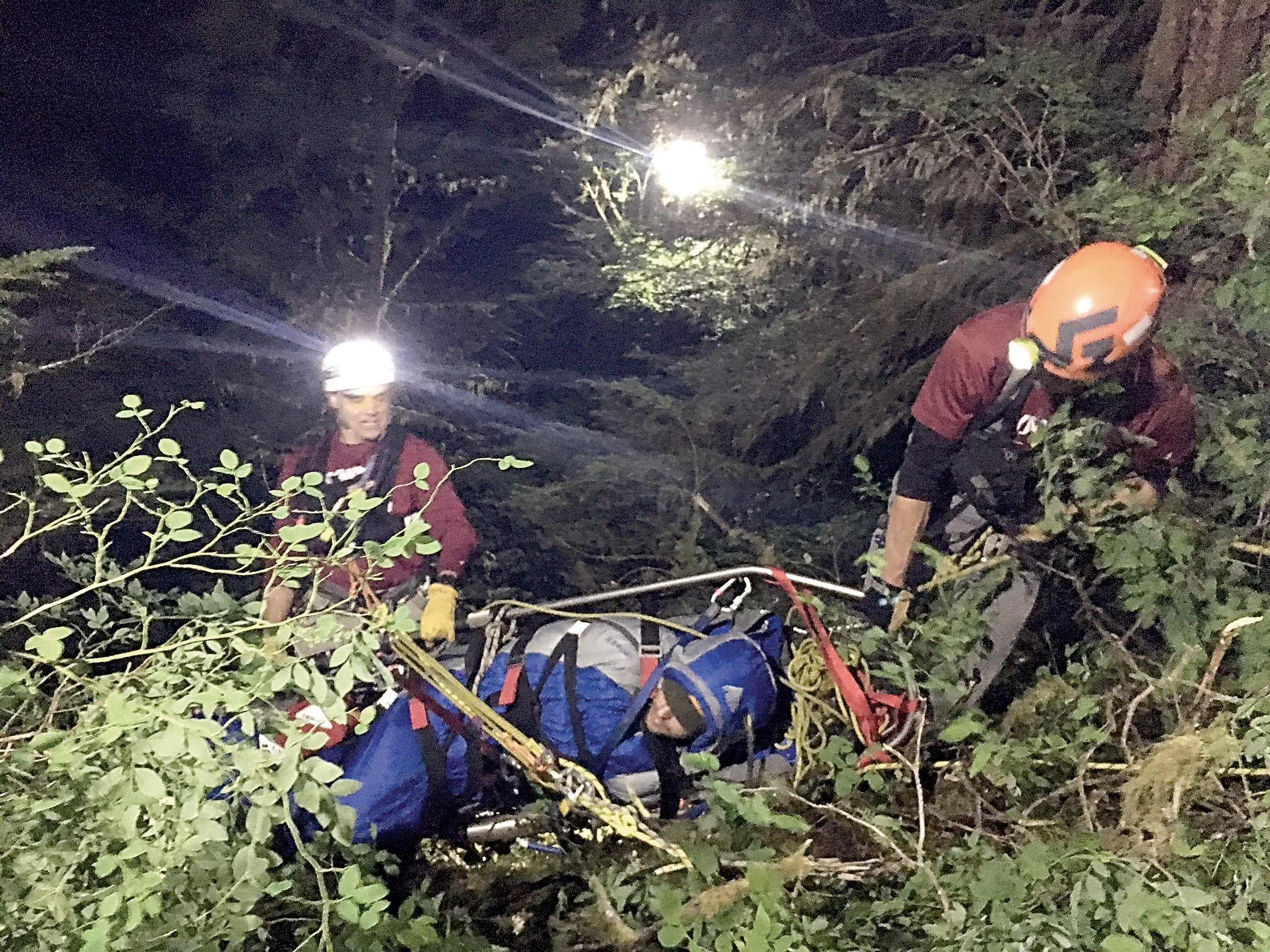 Emergency personnel from Clallam County District No. 2 haul hiker Josh Reciert of Lynnwood back to safety. — County Fire District No. 2 ()