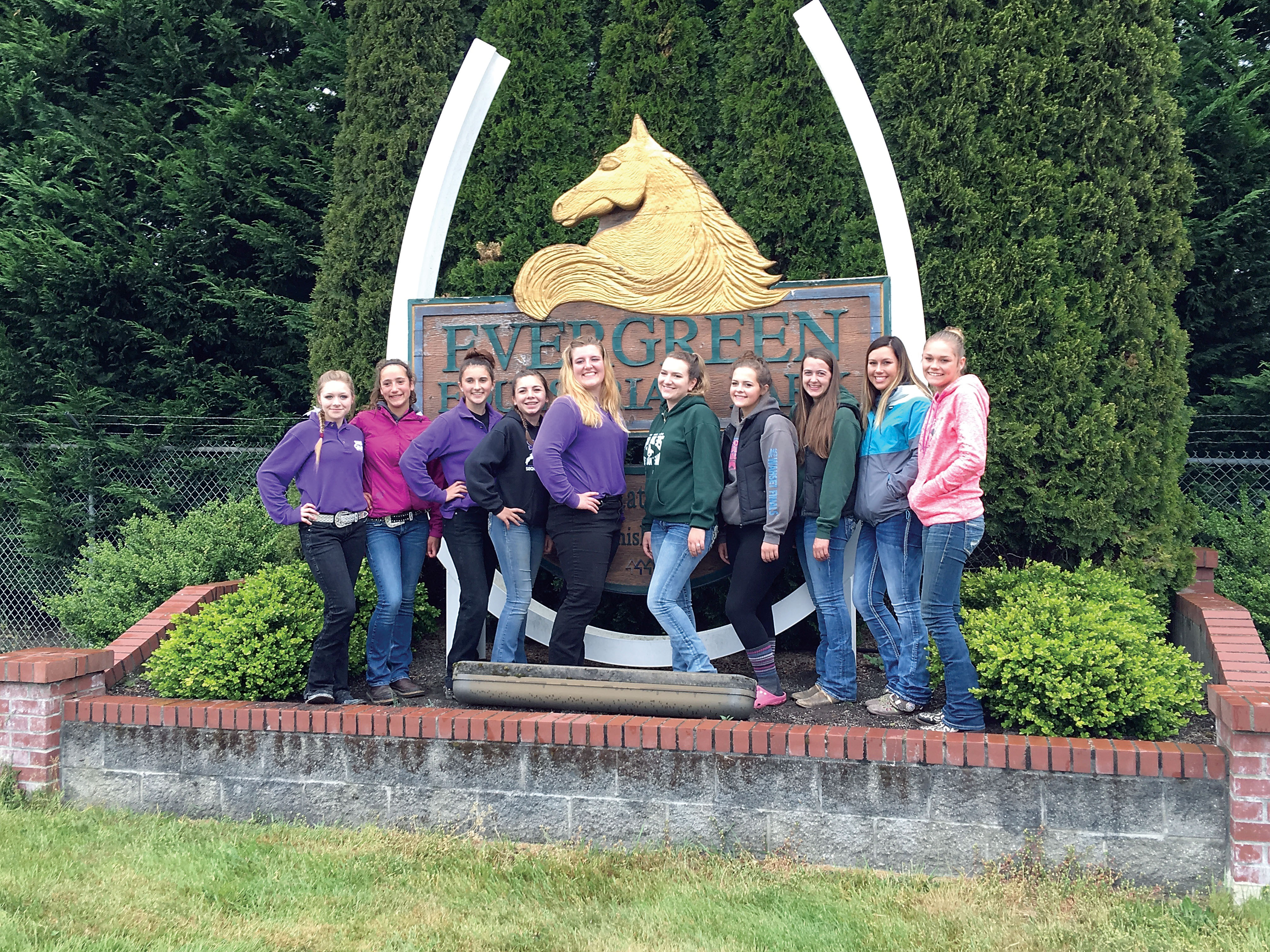 The Port Angeles and Sequim High School equestrian teams recently competed at the Washington High School Equestrian Team State Finals in Monroe. Shown here are members of the Sequim and Port Angeles teams