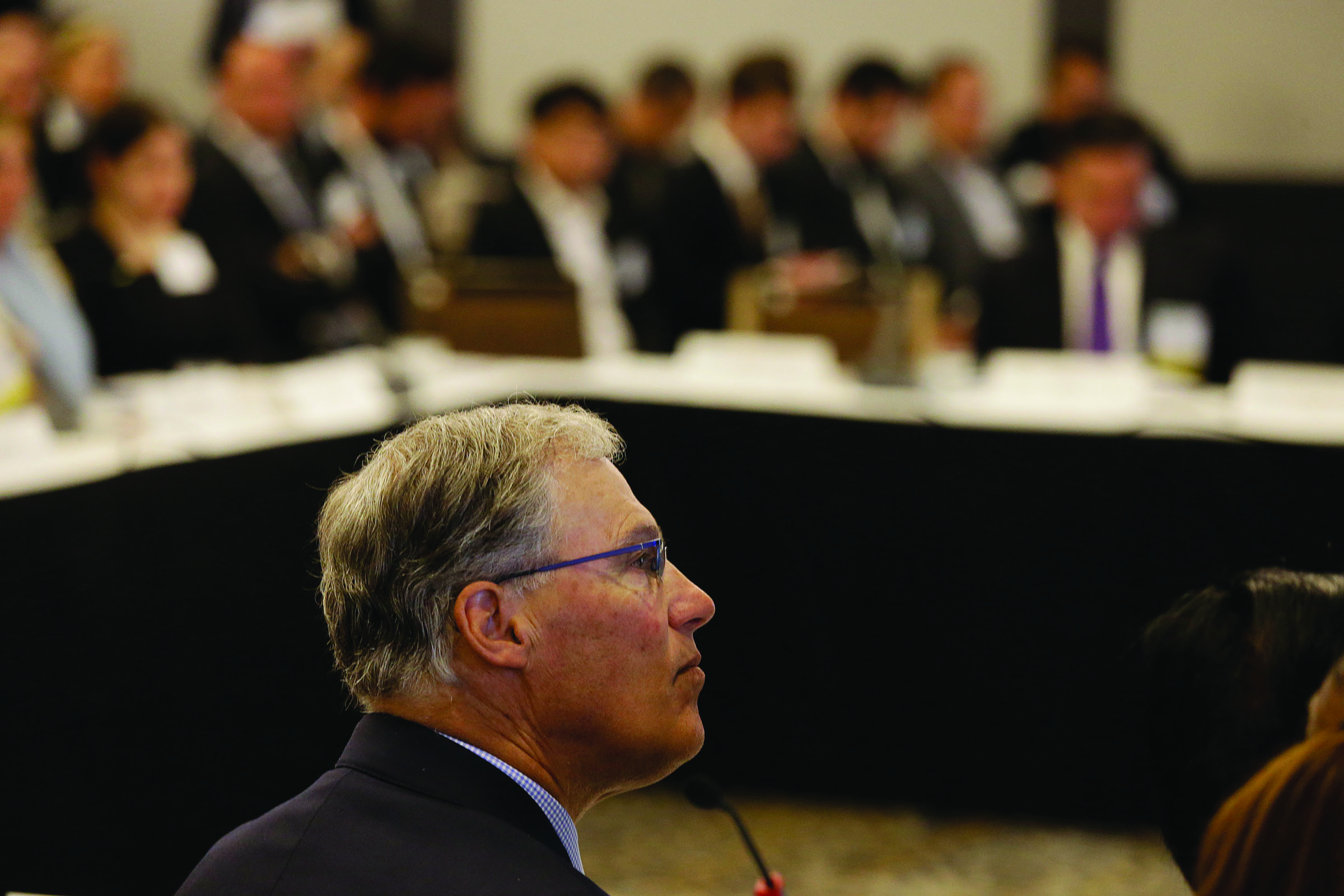 Washington Gov. Jay Inslee listens to California Gov. Jerry Brown deliver his keynote address during the Subnational Clean Energy Ministerial on Wednesday in San Francisco.  The Associated Press ()