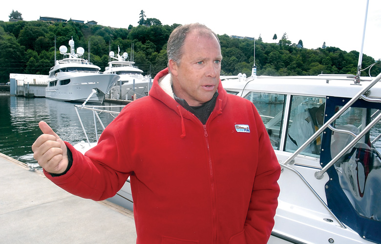 Steve Walker describes the difficulties he encountered in his attempt to swim across the Strait of Juan de Fuca from Beechey Head to Port Crescent on Thursday. — Keith Thorpe/Peninsula Daily News ()