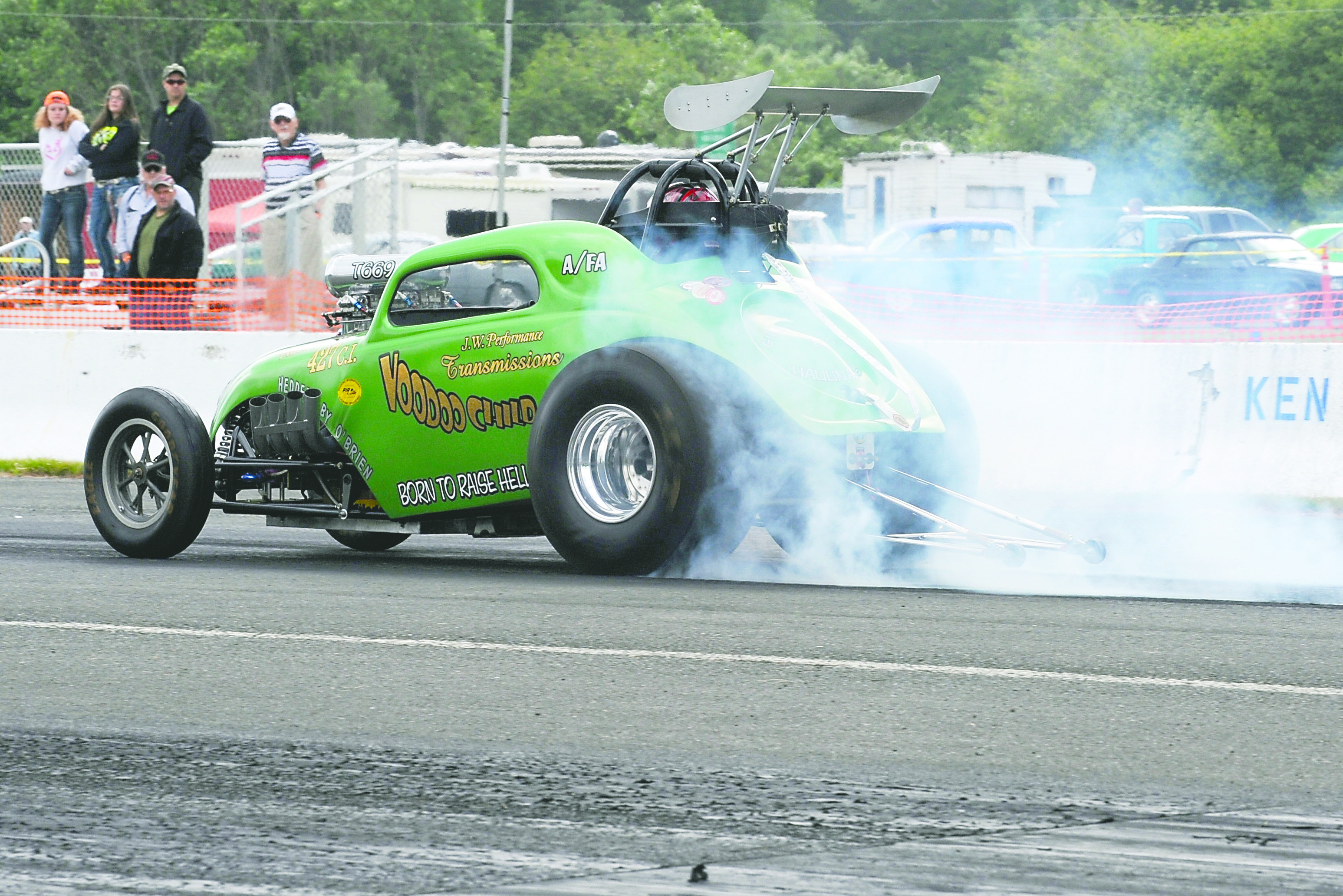 Allan Thornock of Sequim burns rubber en route to the starting line during one of West End Thunder's 2014 car races. (Lonnie Archibald/for Peninsula Daily News)