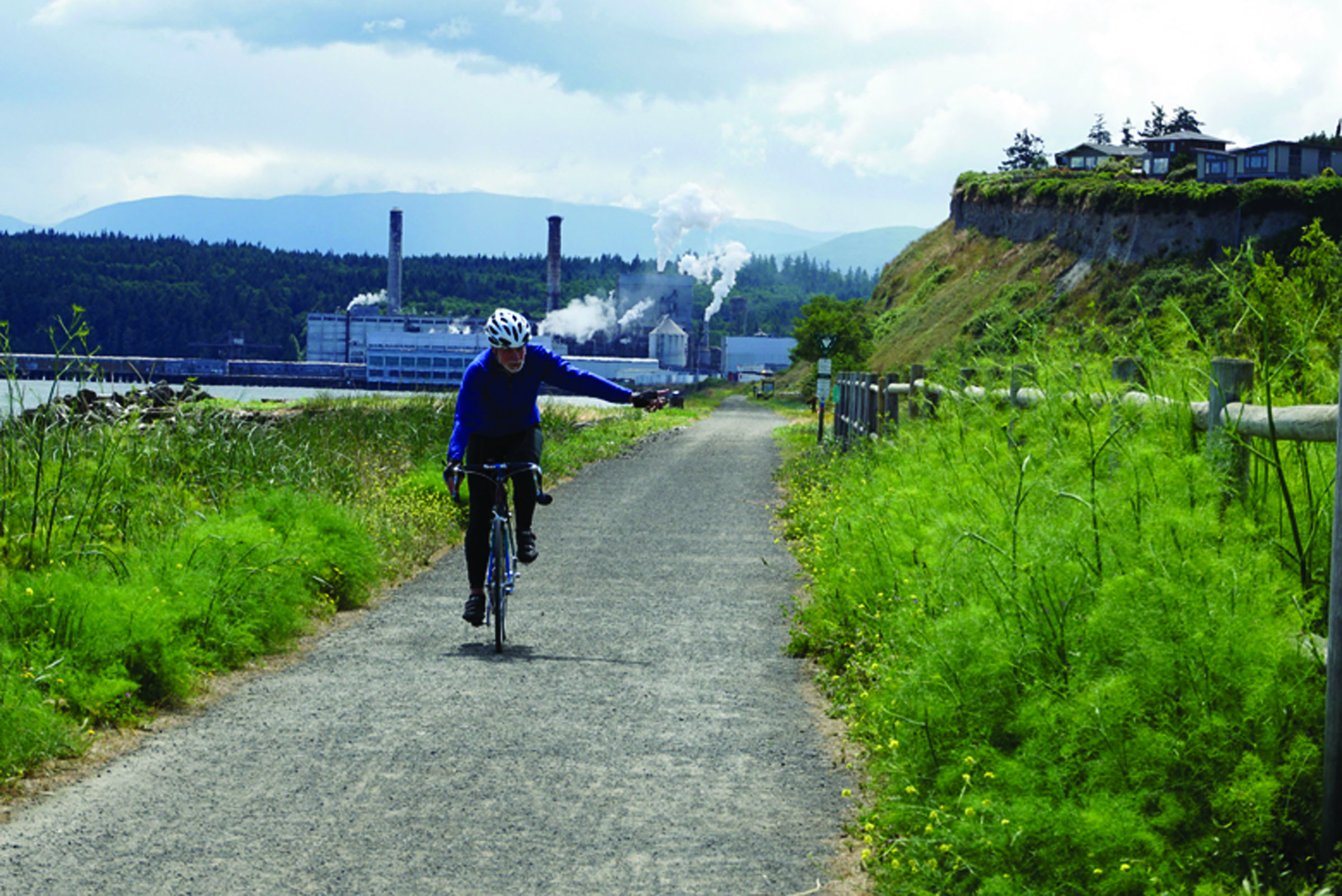 Phil Walkden of Port Townsend takes a spin on the Larry Scott Trail on Thursday. The Longest Day of Trails race on Saturday is for runners and walkers only. (Charlie Bermant/Peninsula Daily News)