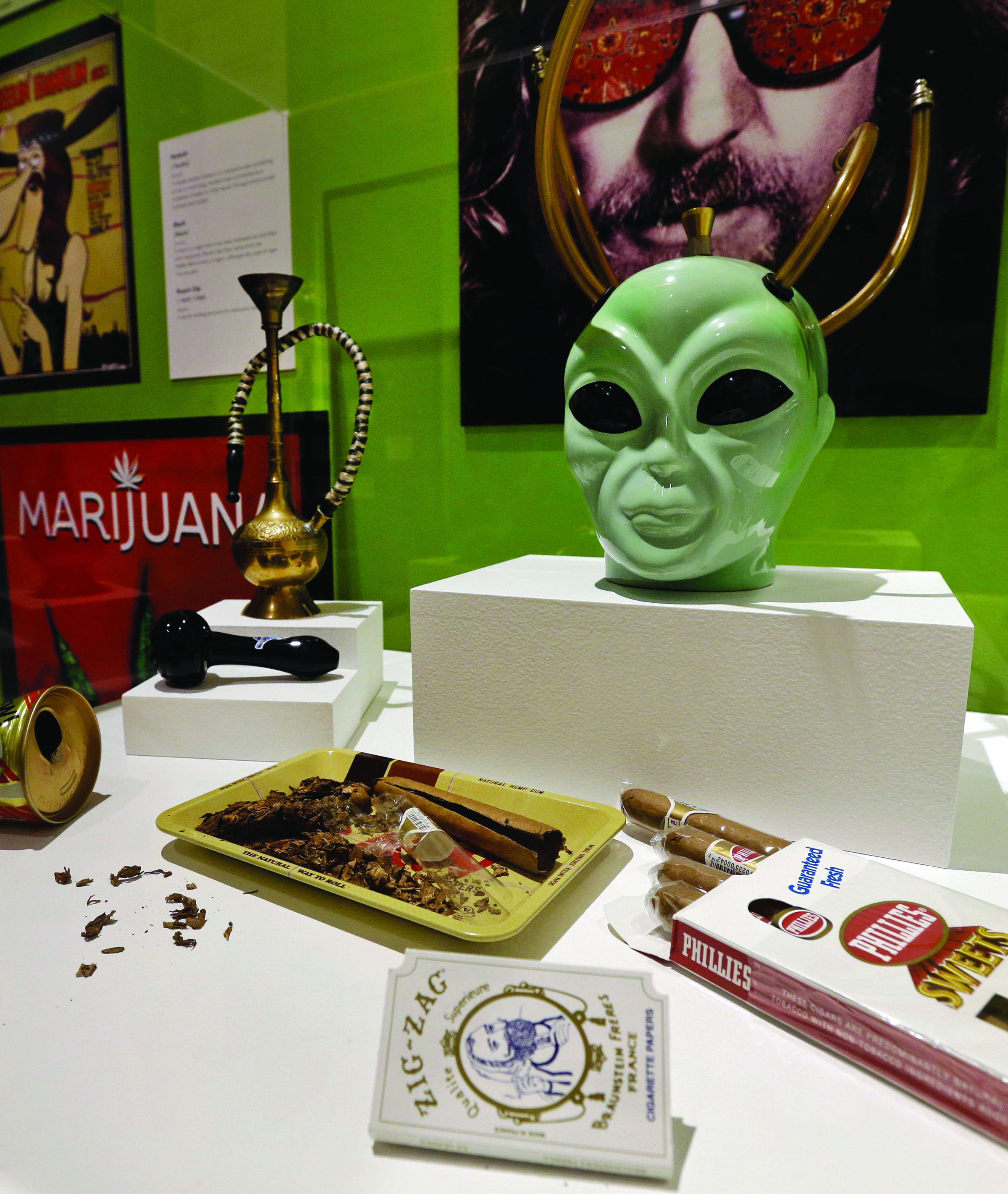 Marijuana smoking paraphernalia sits on display May 26 as part of the “Altered State: Marijuana in California” exhibit at the Oakland Museum of California in Oakland