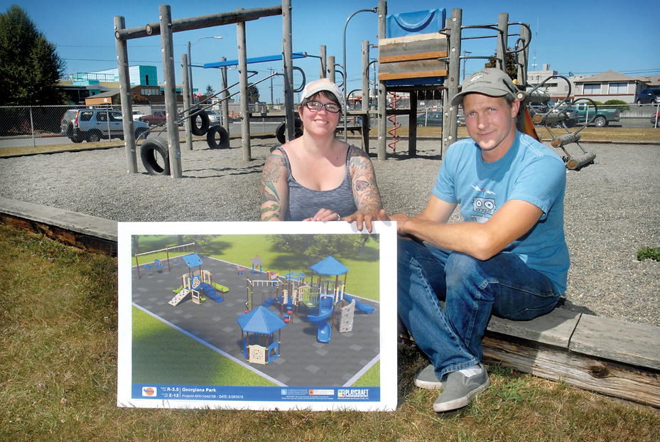 Kristan and David Mabrey display a rendering of new playground equipment that will be installed in Georgiana Park in Port Angeles