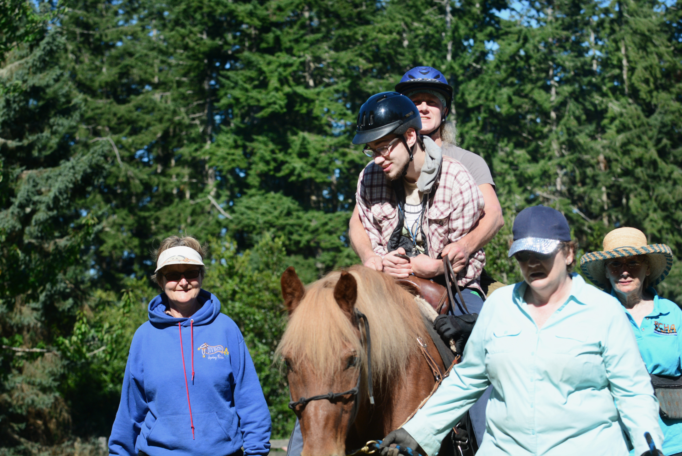 Camp Beausite NW camper Higgins Moore rides a horse last week outside Chimacum. (Jesse Major/Peninsula Daily News)