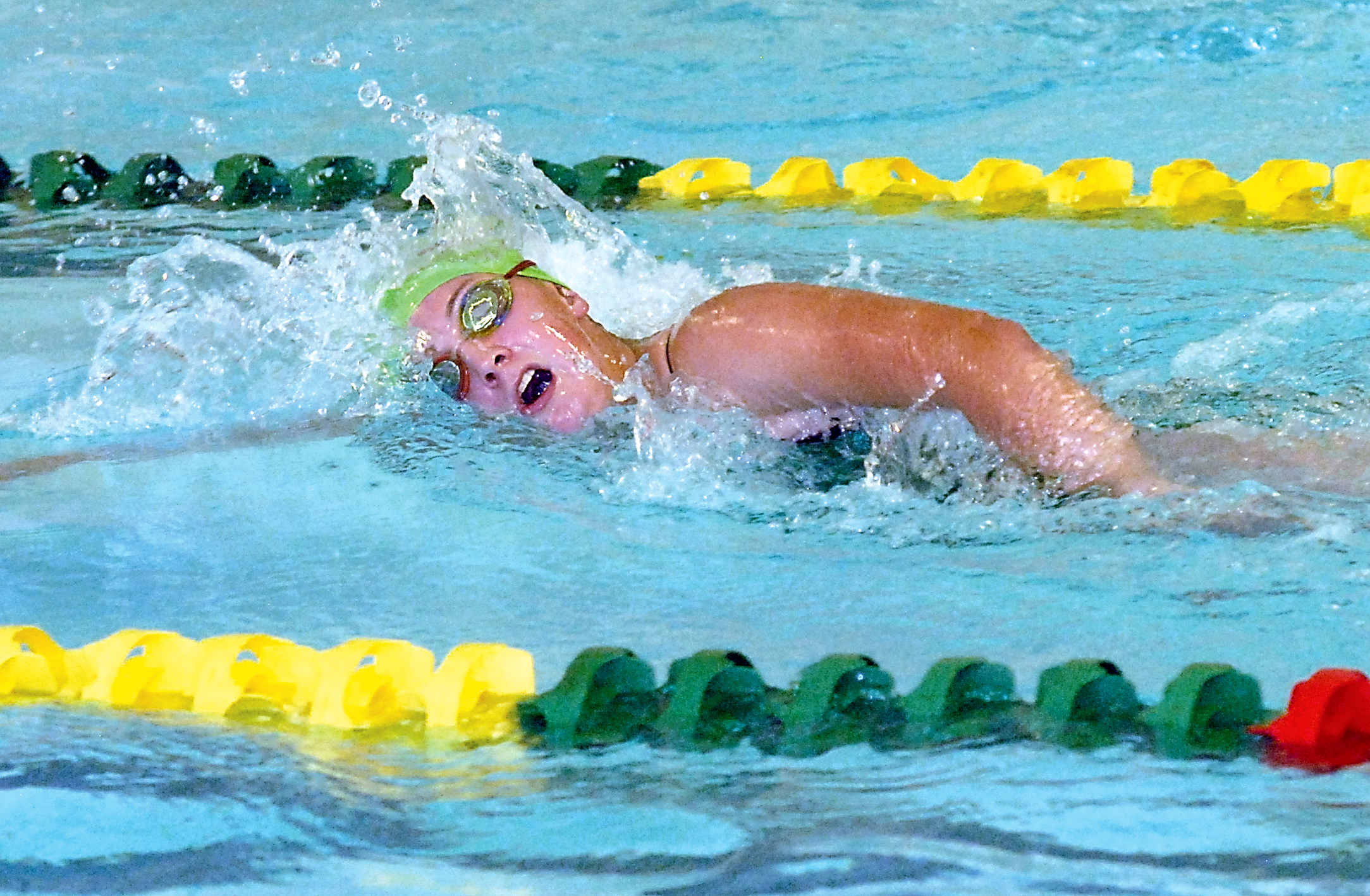 Port Angeles' Erin Edwards swims in the 500-yard freestyle event in a meet against Kingston at William Shore Pool in Port Angeles on Tuesday. Edwards won the event and earned a district-qualifying time. Keith Thorpe/Peninsula Daily News
