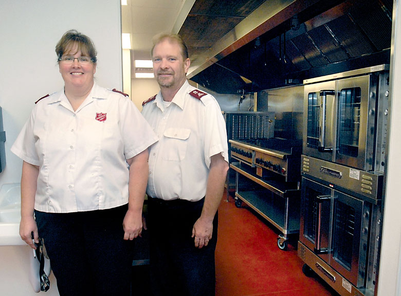 Salvation Army Majors Sabrina and John Tumey plan to cease overnight shelter operations at the organization's new community service center at Second and Peabody streets in Port Angeles in order to concentrate on other programs to help the needy. Keith Thorpe/Peninsula Daily News