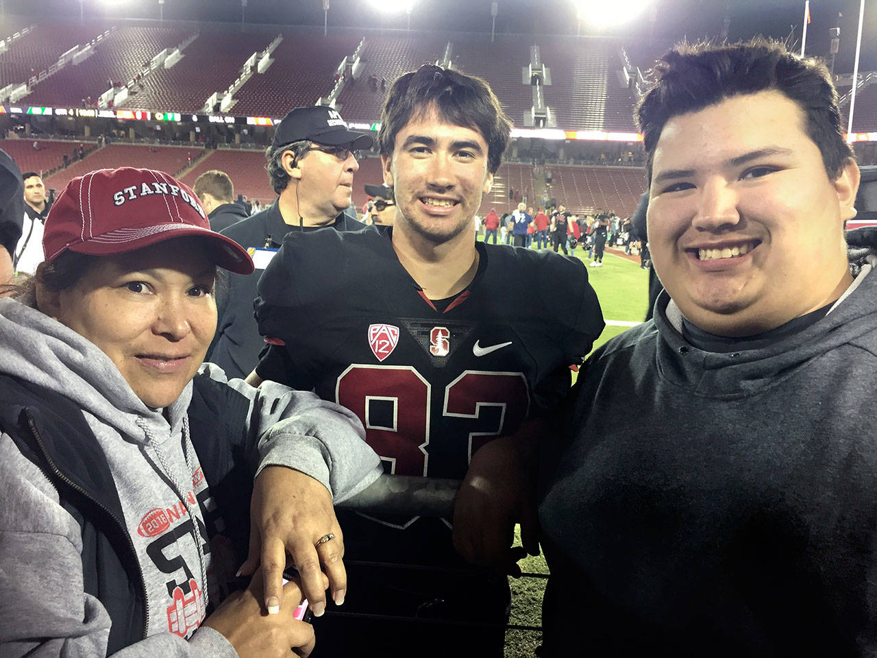 Maiya Buzzell Cameron Buzzell, center, a walk-on wide receiver with Stanford, visits with his friend Matt Reamer, right, and Reamer’s mom Carol, after a game against Oregon earlier this season.