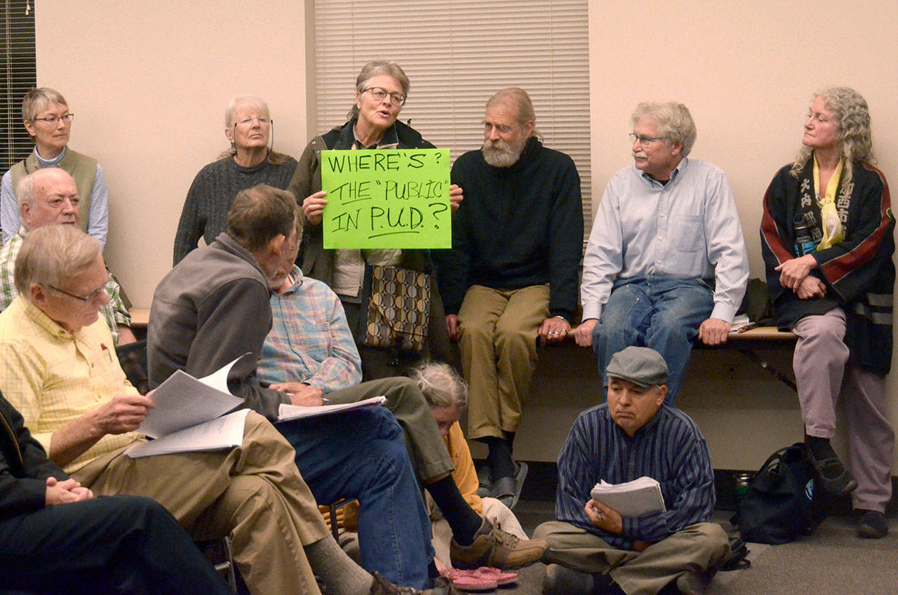 Karen Sturnick shares her concerns at a meeting Monday over the Jefferson County PUD’s plan to implement smart meters. (Cydney McFarland/Peninsula Daily News)