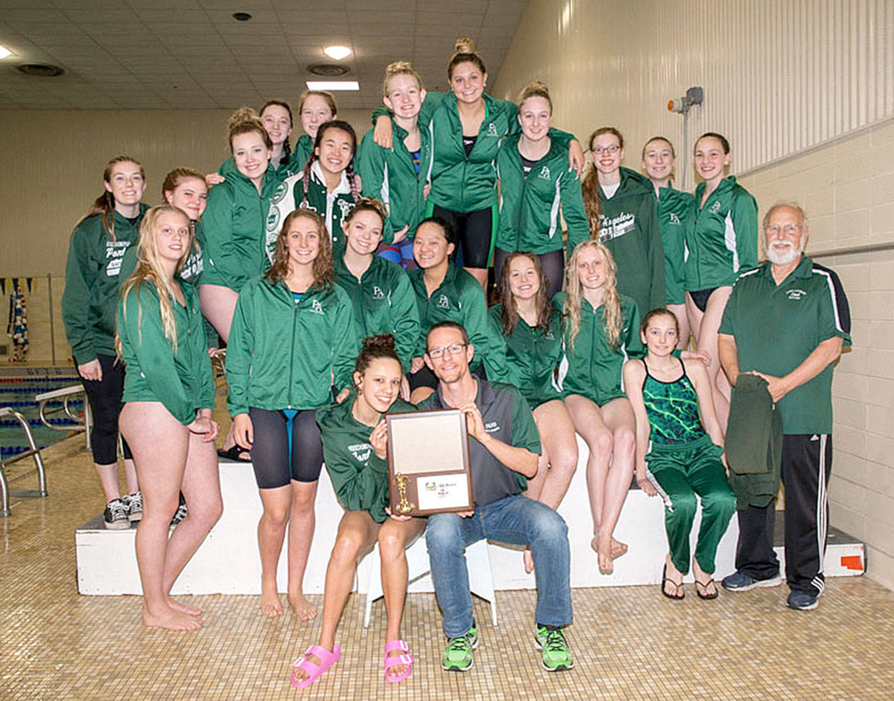 The Port Angeles girls swim team after winning the West Central District III 2A/1A championship Saturday. The girls now move to the state 2A swim meet beginning Friday in Federal Way. From left, rear are Cassii Middlestead, Lily Robertson, Jane Rudzinski, Kiara Amundson, Taylor Beebe, Lum Fu, Emma Murray, Kenzie Johnson, Nadia Cole, Emma Weller, Ginnie Litle and Brianna Tiemersma. From left, front are Ashlee Seelye, Erin Edwards, Sierra Hunter, Felicia Che, Kiara Schmitt, Tana Hiigel, Adriana McClain and coach Pete VanRossen. From left, front, are Maggie Martin and head coach Rich Butler. (Patti Reifenstahl)