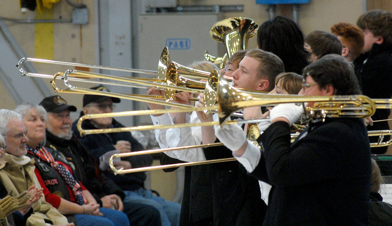 Members of the Port Angeles High School concert band perform for the crowd during a Veterans Day ceremony at U.S. Coast Guard Air Station/Sector Field Office Port Angeles on Saturday. (Keith Thorpe/Peninsula Daily News)