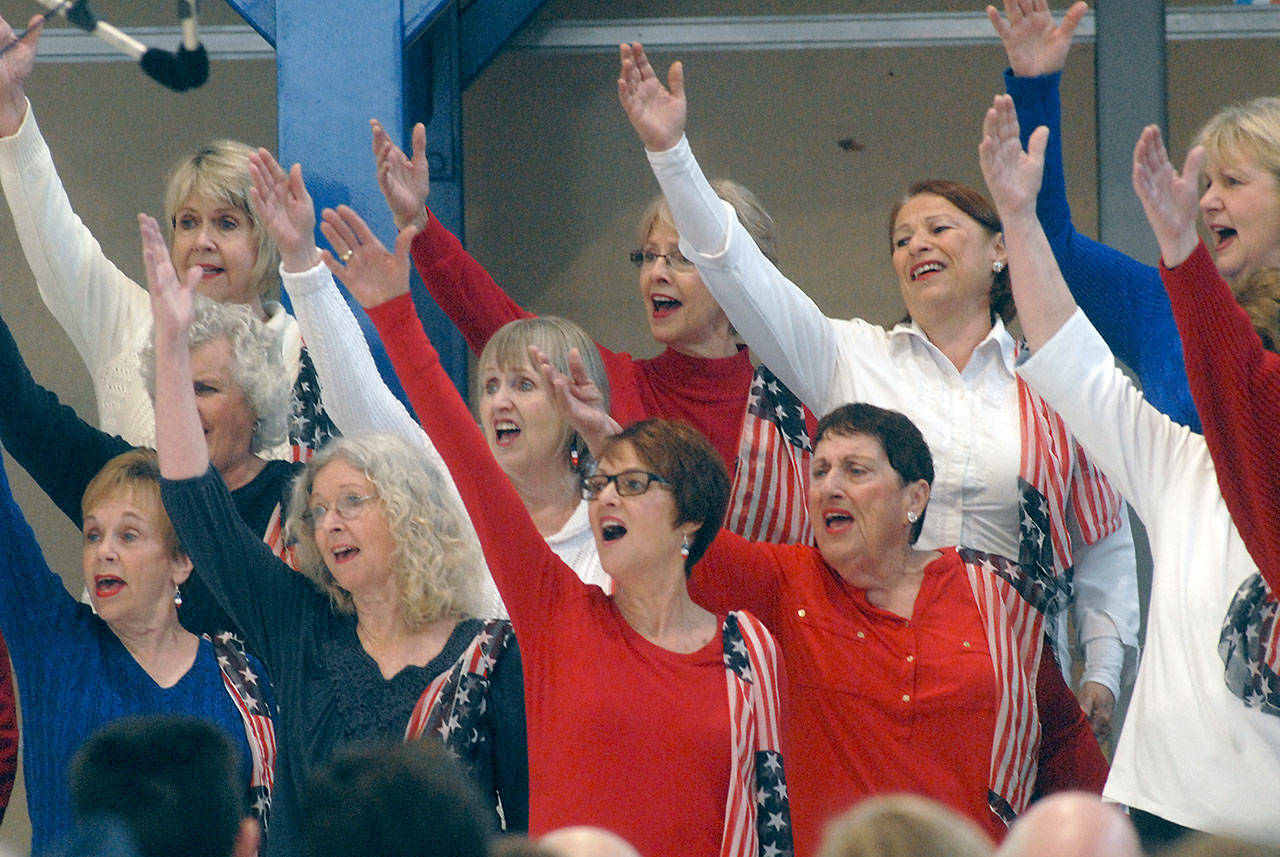 In honor of Veterans Day, members of the Grand Olympic Chorus of Sweet Adeline’s International perform a series of patriotic songs on Veterans Day in Port Angeles. (Keith Thorpe/Peninsula Daily News)