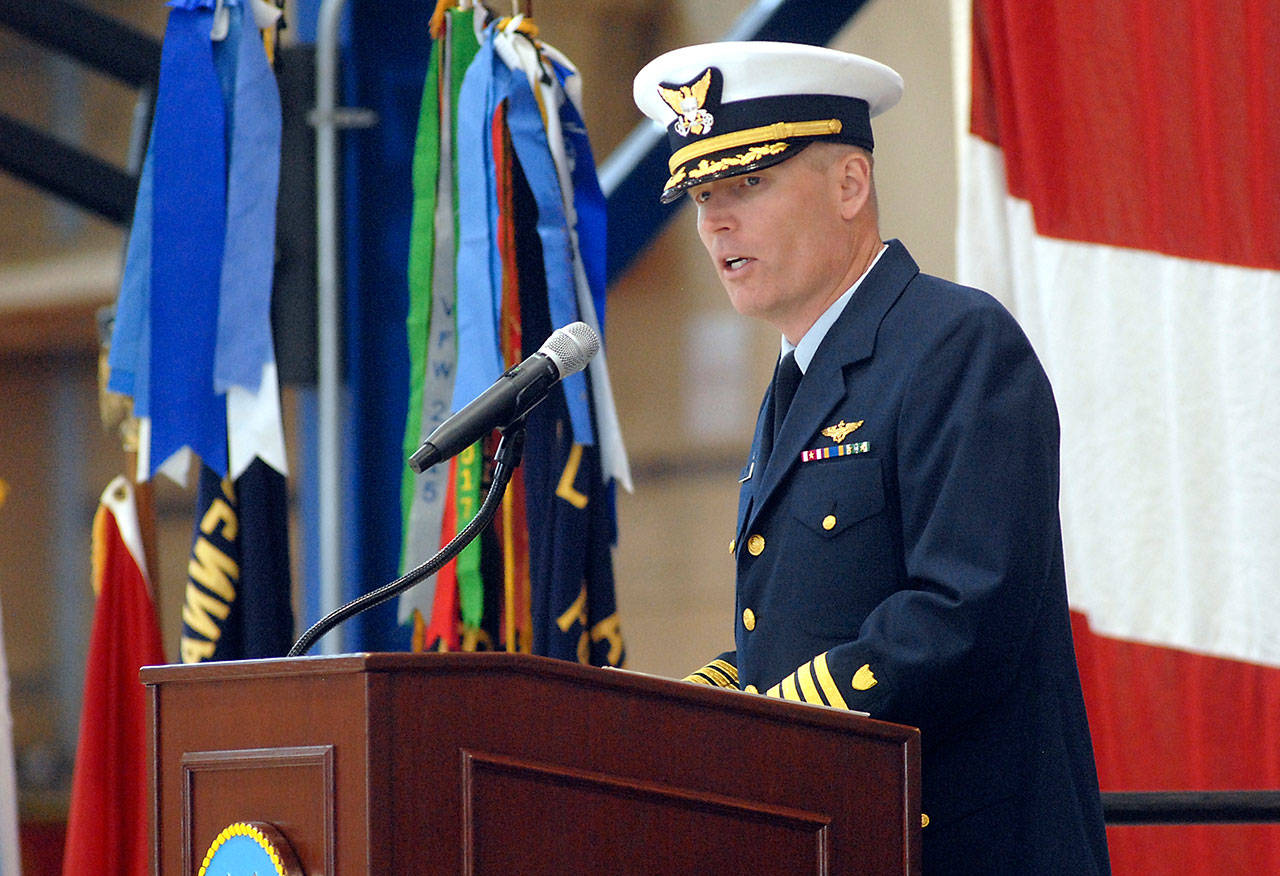 Capt. Mark Hiigel, commanding officer of U.S. Coast Guard Air Station/Sector Field Office Port Angeles, delivers opening remarks to veterans and guests during a Veterans Day ceremony in Port Angeles. (Keith Thorpe/Peninsula Daily News)