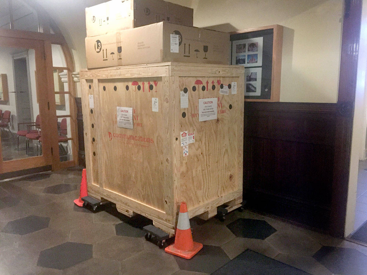 Boxes in the basement of the Jefferson County Courthouse in Port Townsend hold metal detectors and other security equipment that will be implemented on the second floor. (Cydney McFarland/Peninsula Daily News)