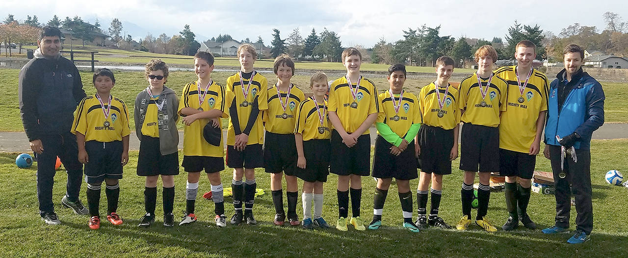 The U-15 Mighty Max Yellow Jackets recently wrapped their fall soccer season with a 9-1 record. The team scored 46 goals and yielded 19 this season. Coaches and team members are, from left, assistant coach Dale Seera, Tyson Hartman, Piers Davis, Sam Rees, Luke Gavin, Kade Kirsch, Jayden McLarty, Joe Hill, Parabjot Seera, Caleb McLarty, Zach Gavin, Nathan Seelye and head coach Andrew McLarty. Not pictured: Brandon Sofie.