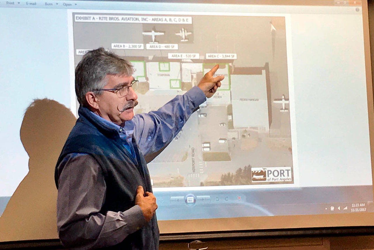 Jeff Well, owner of Rite Bros. Aviation, explains how moving his administrative offices into the vacant terminal building at William R. Fairchild International Airport will affect his business at a Port of Port Angeles commissioners’ meeting Tuesday. (Paul Gottlieb/Peninsula Daily News)