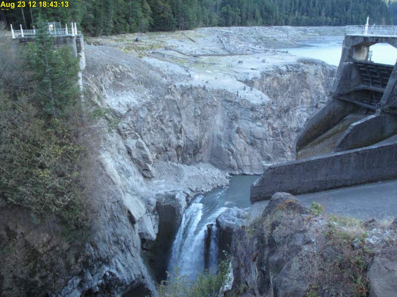 Glines Canyon Dam as of Aug. 23. Almost half of the 210-foot dam is now gone. ONPwebcam viewable at www.peninsuladailynews.com