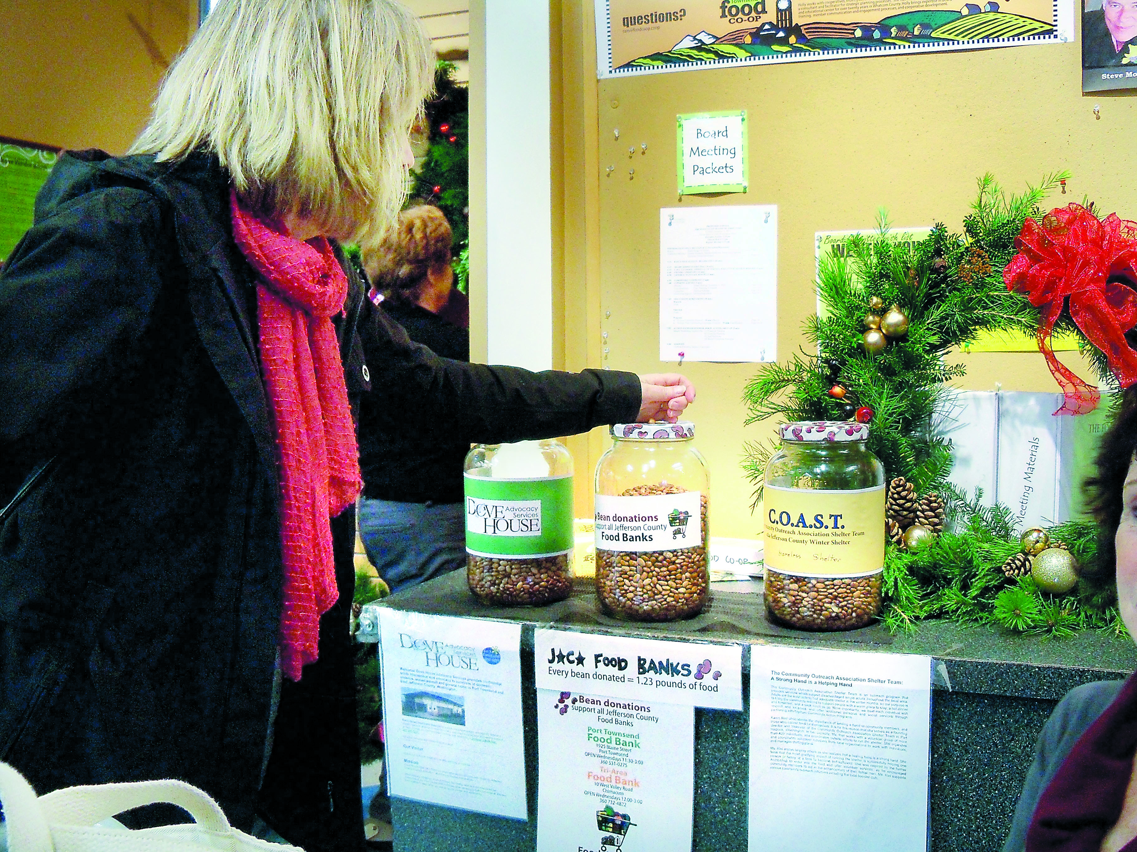 The Port Townsend Food Co-op's “Beans for Bags” program lets members who bring in reusable bags for their groceries choose from a 5-cent refund or a bean worth 5 cents that they can drop in their choice of glass gallon jars designated for three local nonprofit organizations.
