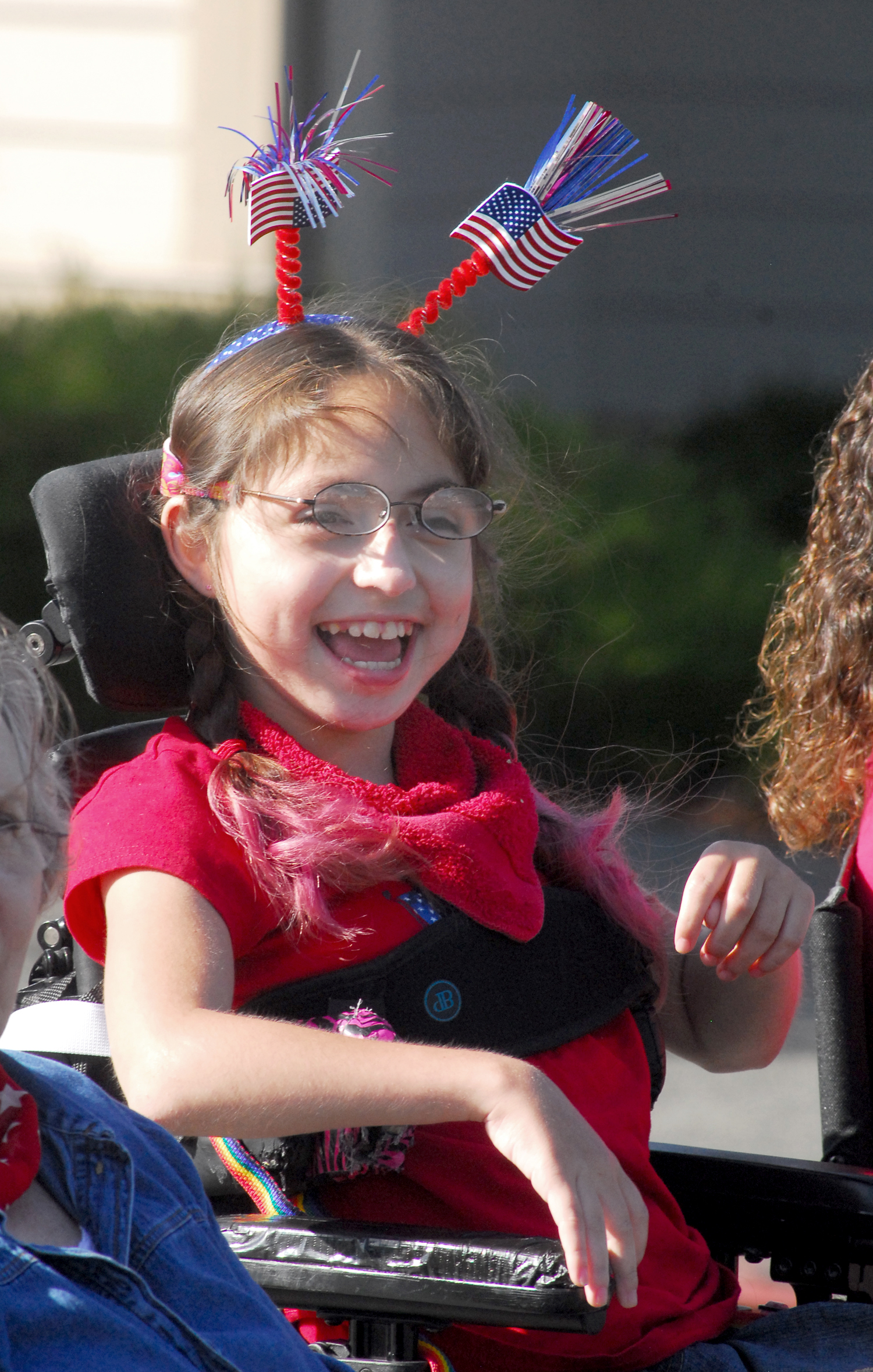 Thirteen-year-old Makyla Johnson of Port Angeles shows delight from the sidelines as the parade is about to start. Keith Thorpe/Peninsula Daily News