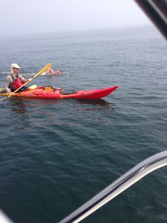 Accompanied by a support crewman in a kayak