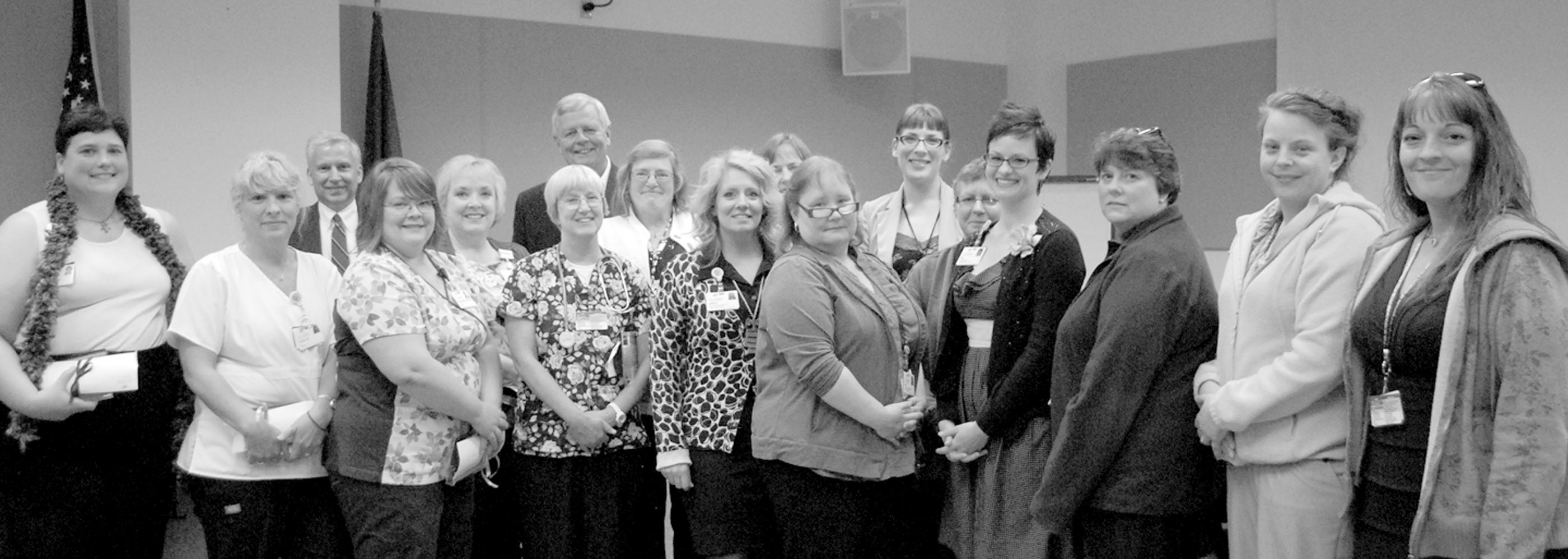 Eighteen Olympic Medical Center employees recently were recognized for their efforts in implementing the OMC's new Epic electronic health record system. From left are Amber Adkins