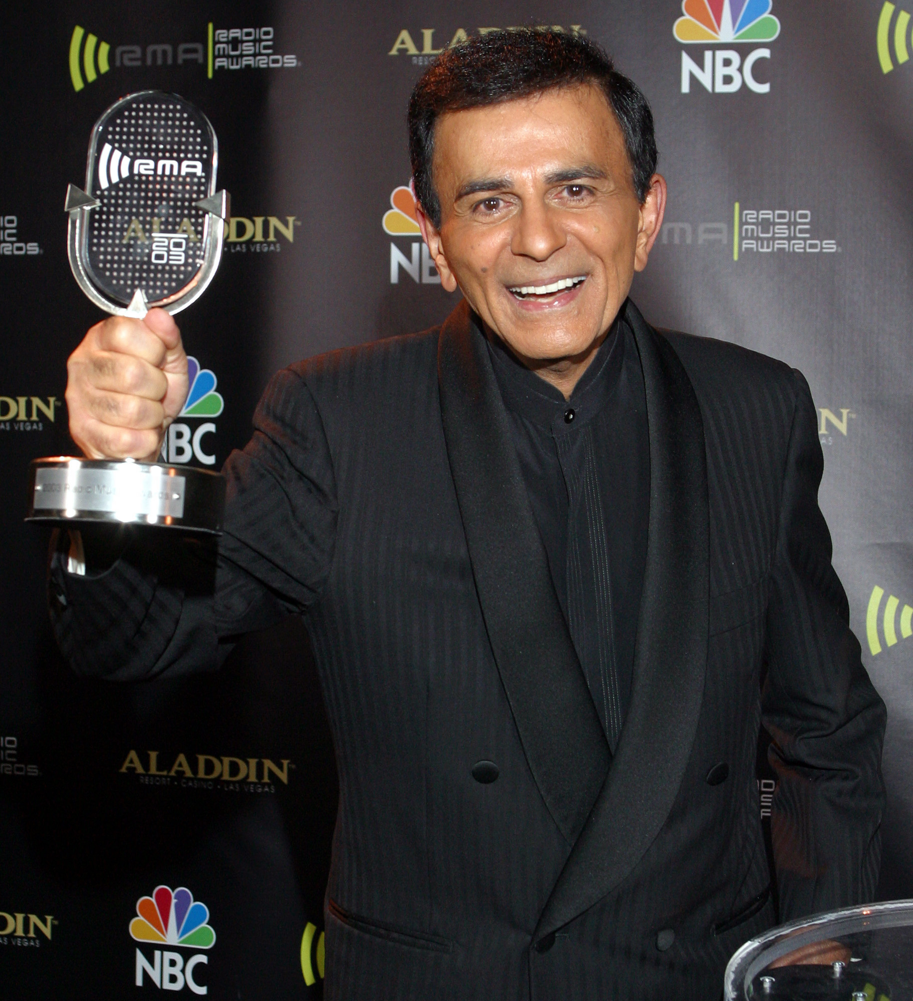 Casey Kasem poses for photographers after receiving the Radio Icon award during The 2003 Radio Music Awards at the Aladdin Resort and Casino in Las Vegas on Oct. 27