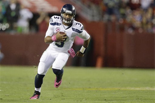 Seattle Seahawks quarterback Russell Wilson scrambles during Monday night's game against the Washington Redskins in Landover