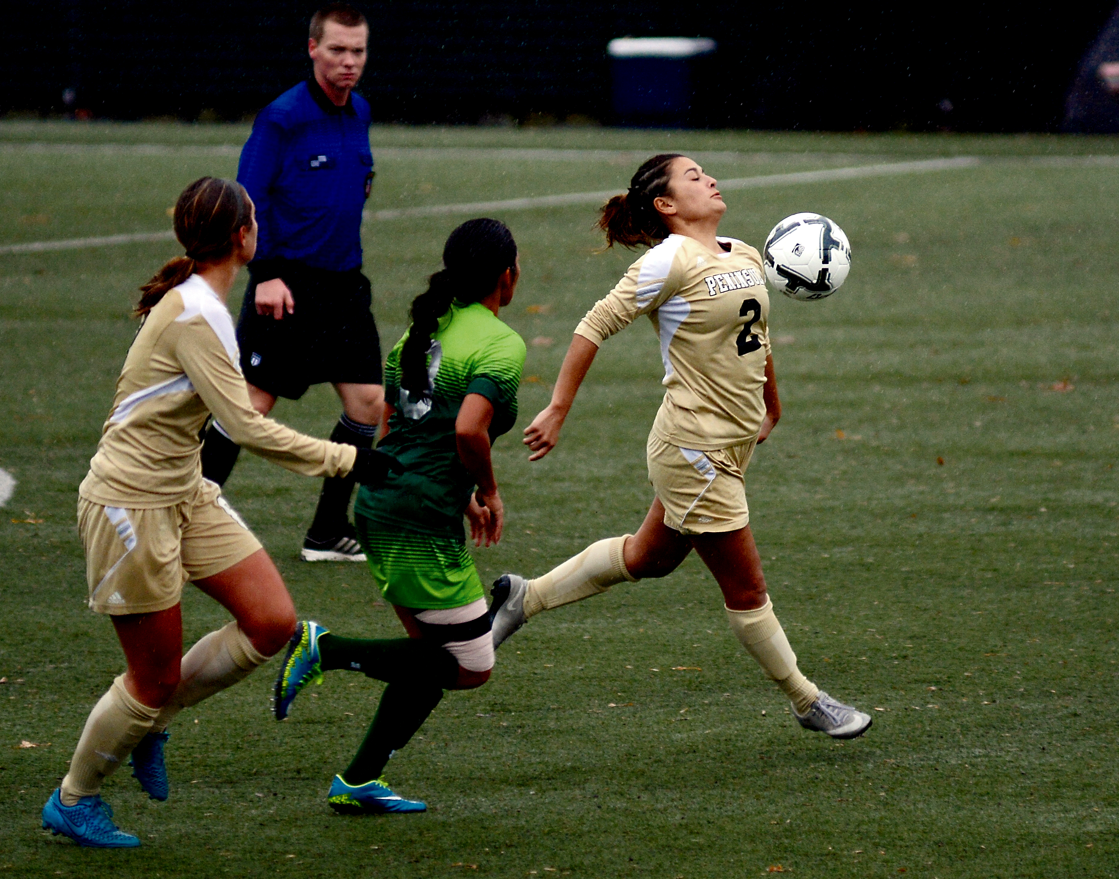 Peninsula College's Olivia Moore controls the ball ahead of Highline's Dulce Armas and teammate Michele Whan during the NWAC semifinals at Starfire Complex in Tukwila on Saturday. Jay Cline/for Peninsula Daily News