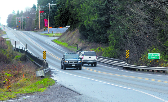 Vehicles pass each other on the stretch of U.S. Highway 101 at McDonald Creek. Keith Thorpe/Peninsula Daily News