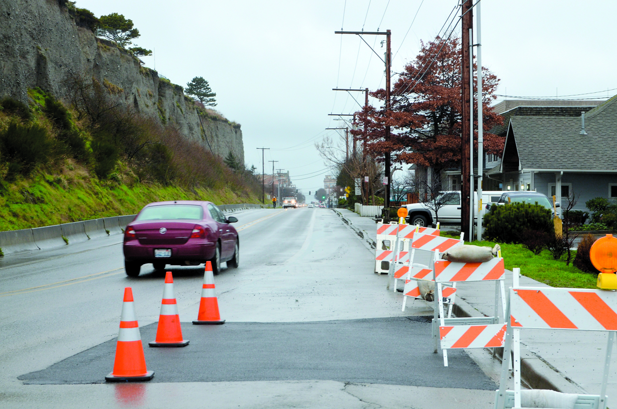 A patch covers the place where a water main burst on Water Street in Pot Townsend. Charlie Bermant/Peninsula Daily News