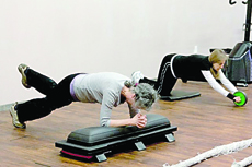 Equestrians Mary Tulin and Marilyn Crimmel are two of several folks who tone their bodies for riding by participating in Freedom Farm's Rider Fitness Class every Saturday at Sequim's Anytime Fitness. Rick Crimmel