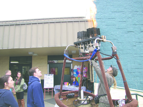 Balloonist Crystal Stout advertises her business