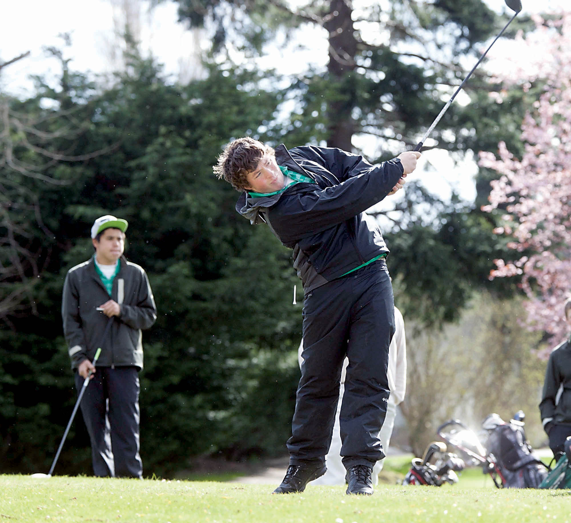 Port Angeles' Alex Atwell tees off on the first hole of a match against the Port Townsend Redskins at Port Townsend Golf Course. Steve Mullensky/for Peninsula Daily News