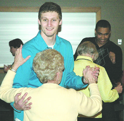 Student Bryce Jacobson participates in the 2011 senior dance hosted by Peninsula College. Another free dance