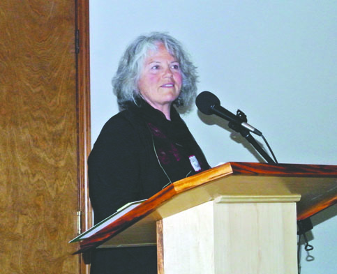 Kris Mayer of Port Townsend speaks to the Jefferson County Chamber of Commerce on Monday. Charlie Bermant/Peninsula Daily News