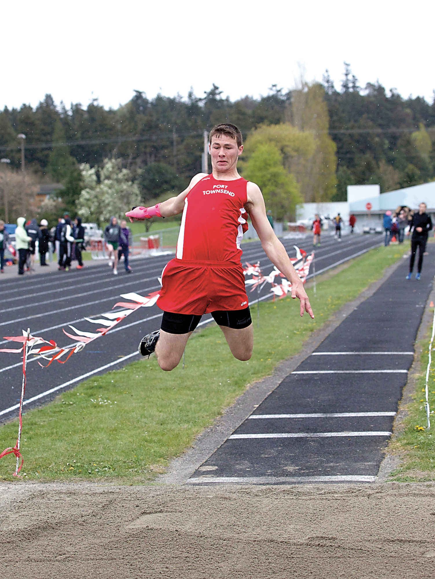 Port Townsend's Skyler Coppenrath triple jumps for a distance of 41 feet and 10 inches during a track and field meet at Blue Heron Middle School in Port Townsend Steve Mullensky/for Peninsula Daily News