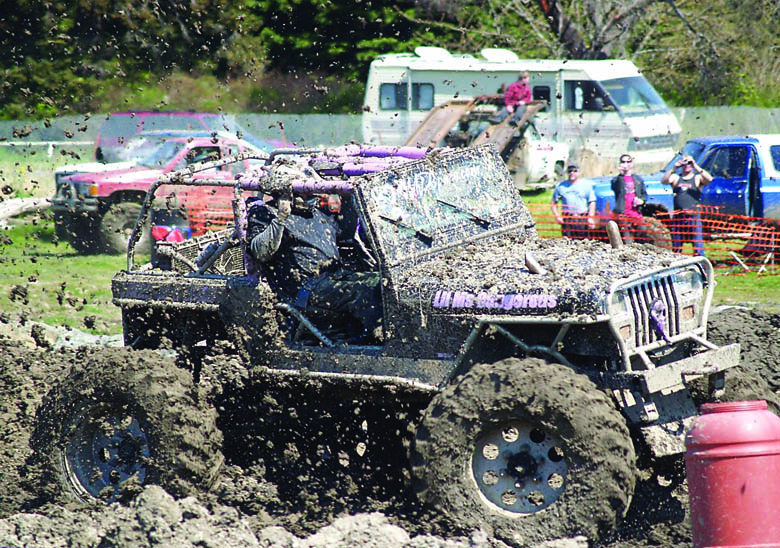 A driver guides his Jeep through the mud obstacle course at 2013's Jeffco Expo at the Jefferson County Fairgrounds in Port Townsend. Jefferson County Fair Association