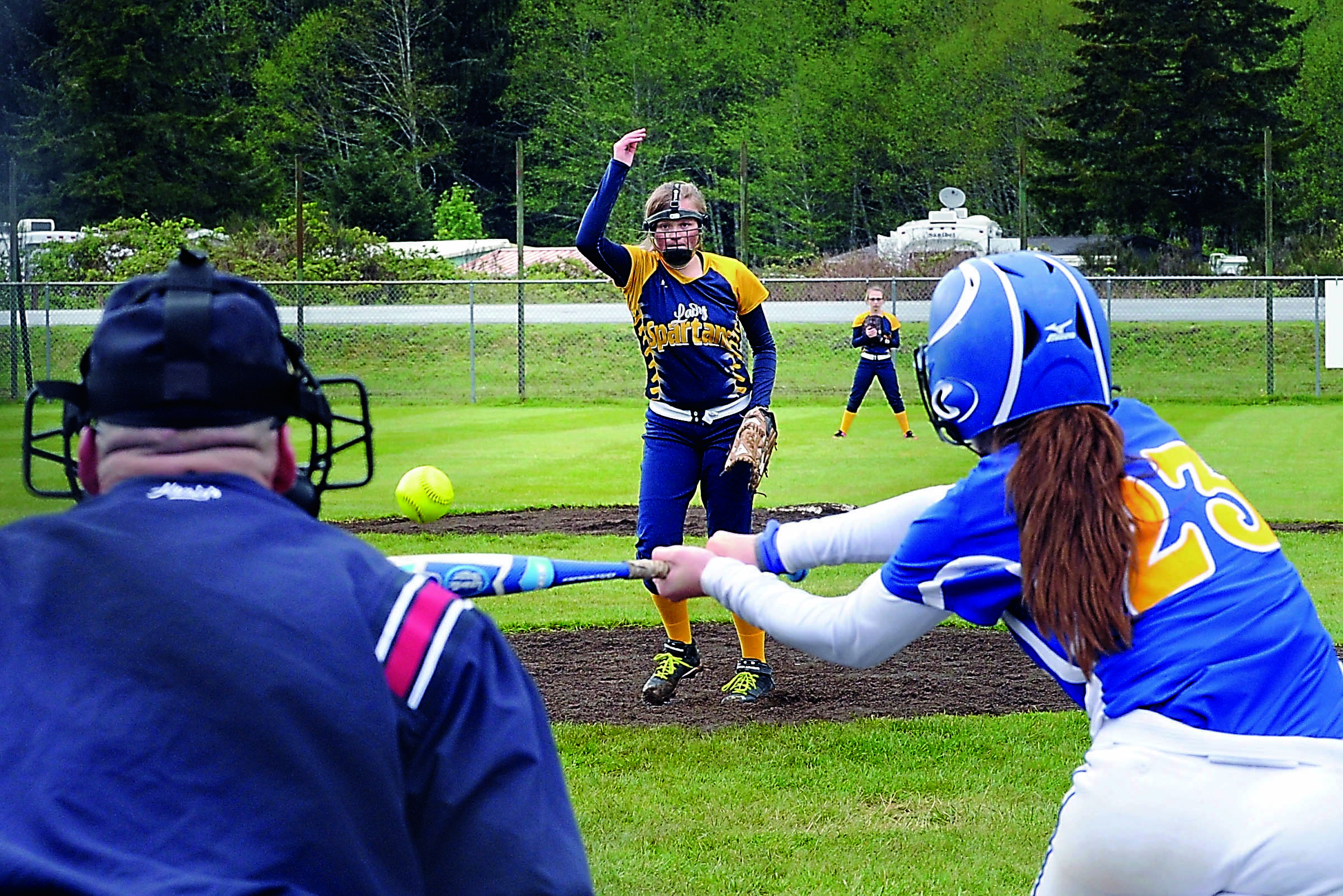 Rochester's Madison Justus swings at a pitch thrown by Fork's Sarah Adams during the second game of a doubleheader with the Warriors. Forks fell 7-3 and 12-2. Lonnie Archibald/for Peninsula Daily News