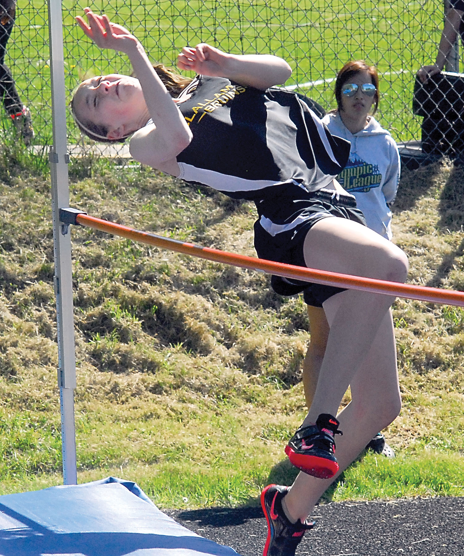 Clallam Bay's Molly McCoy clears the bar in the high jump during the North Olympic League meet at Crescent High School. Keith Thorpe/Peninsula Daily News