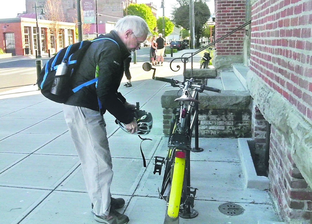 Port Townsend Mayor Dave King rides his bike to work. A celebration of exercise and cycling is set in the city this week. Charlie Bermant/Peninsula Daily News