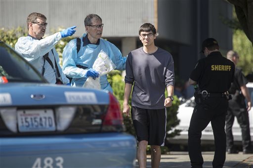 Jon Meis is taken from the shooting scene by medics at Seattle Pacific University. He is the student monitor who is credited with stopping the suspected gunman. The Seattle Times