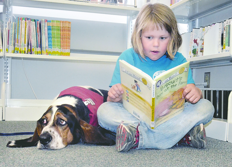 A passage from Biscuit's Day at the Farm is read aloud by Rennie O'Donnell