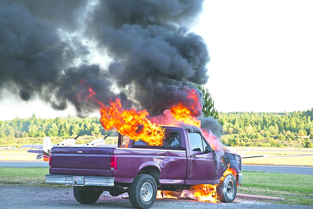 A pickup truck burns Tuesday at the Jefferson County International Airport. Crystal Craig/East Jefferson Fire-Rescue