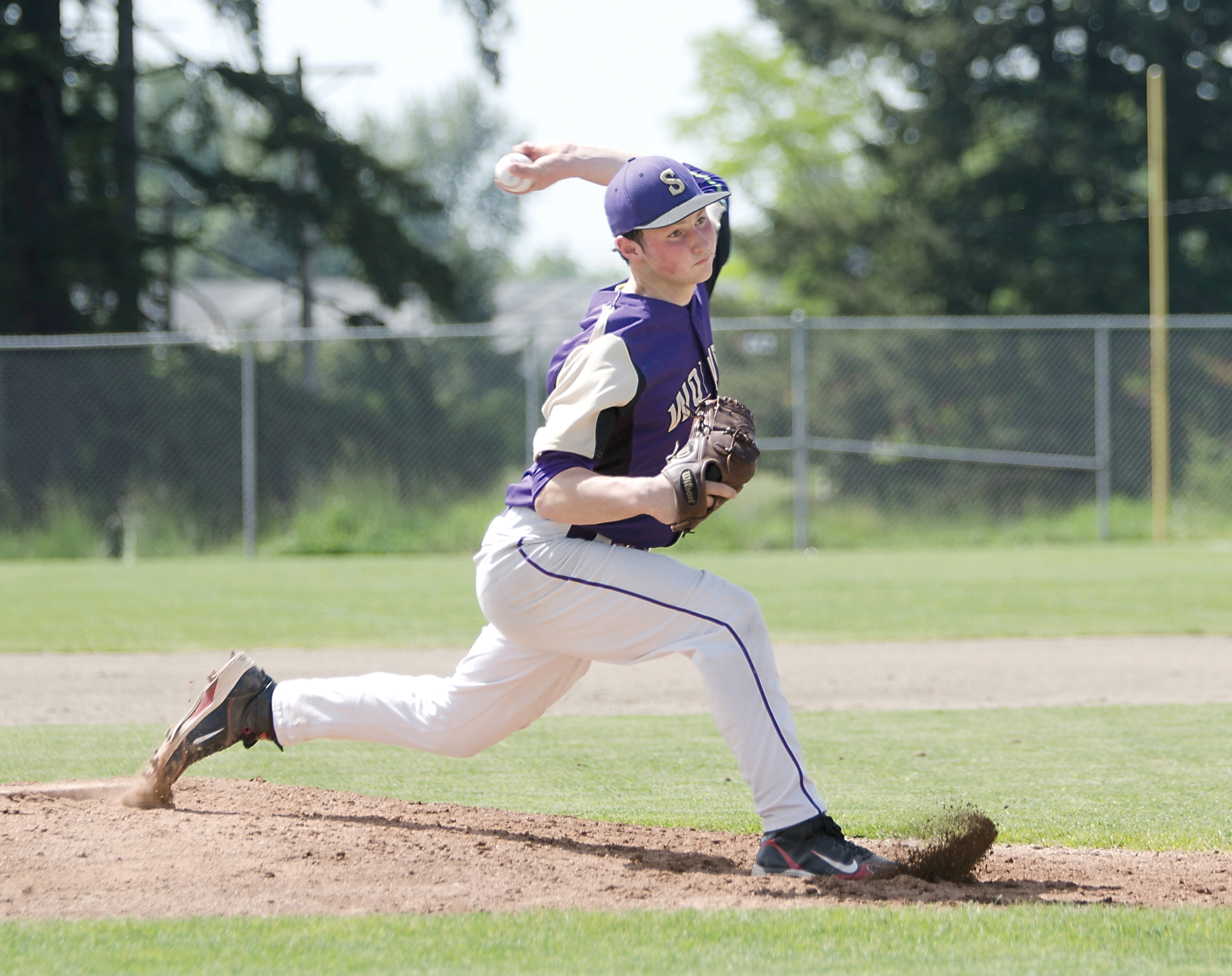 Sequim pitcher Nick Johnston throws against Fife in the West Central District tournament. Johnston